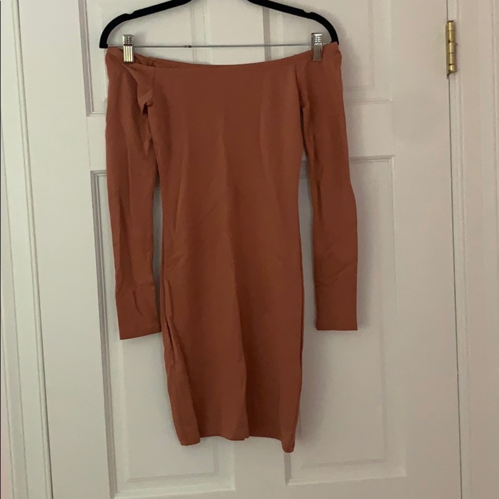Tan body on off the shoulder dress
